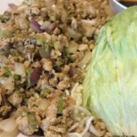 Chicken Lettuce Wrap · Spiced and minced chicken, onion scallion, water chestnut and mushroom served alongside refr...