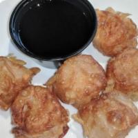 Shumai · Six pieces. Shumai dumplings filled with shrimp, scallion, garlic and ginger. Steamed or fri...