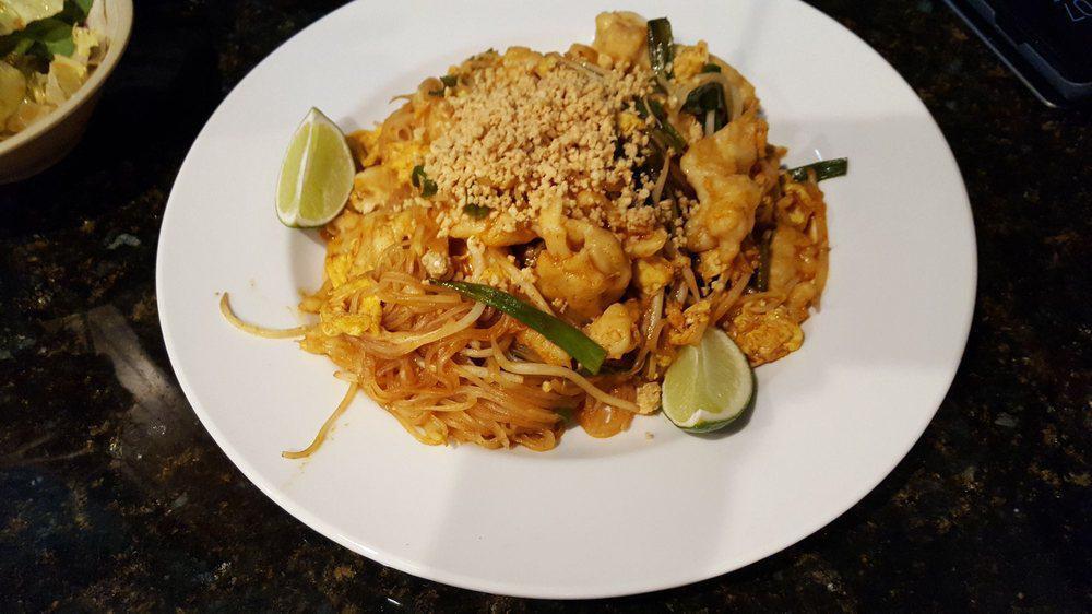 Pad Thai · Thai rice noodle, bean sprout, egg, peanuts and scallion, with sweet and sour sauce.
