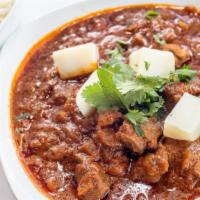 Lamb Vindaloo · Boneless lamb cooked with spices and potato