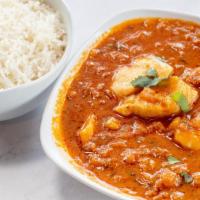 Fish Curry · Fish sautéed with mustard, chillies and curry leaves cooked in onion bases sauce
