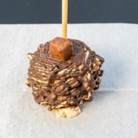 Snickers Caramel Apple · We take our crispy granny smith apple and dip it in our buttery homemade caramel. We dip it ...