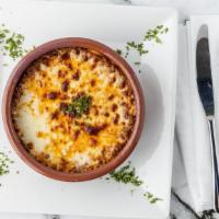 Moroccan Lasagna · Ground beef, peas, black olives, onions, and cheese.