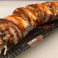 Derby Roll · Spicy crab, asparagus, topped with torched shrimp, torched scallop & eel sauce.