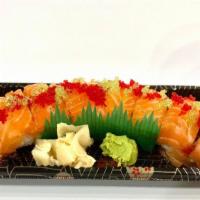 Daisuki Roll · Spicy tuna, avocado topped with salmon, tobiko & sweet chilli sauce.