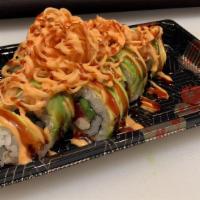 Volcano Roll · Tuna, cream cheese, asparagus topped with spicy crab, avocado, masago, eel sauce & spicy mayo.