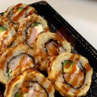Fried Special Roll · Cooked shrimp, crab, avocado, cream cheese topped with eel sauce.