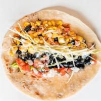 #13 Lunch Taco · black beans, marinated corn, cabbage, patron mayo