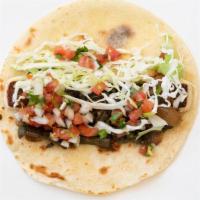 #10 Lunch Taco · grilled queso fresco, rajas, shredded cabbage, pico de gallo