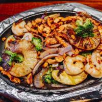 Lunch Hawaiian Fajitas · Grilled chicken, shrimp, and pineapple sautéed with yellow squash, green zucchini, red onion...