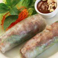 Fresh Summer Rolls  · Rice paper wrapped with meat choices rice noodle lettuce cucumber carrot daikon . served wit...