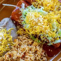 Chile, Relleno, Taco, Rice, & Beans Combo · Ground beef or shredded chicken with ranchera sauce, chile con queso, and white cheese.