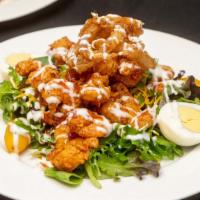 Skeesh Shrimp Salad · Mixed greens with grape tomatoes, cheddar cheese, boiled egg, and fried shrimp tossed in Ske...
