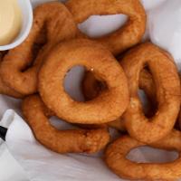 1 Dozen Hushpuppies · Delicious homemade hushpuppy rings are the perfect addition to any meal!