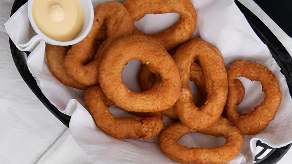 1 Dozen Hushpuppies · Delicious homemade hushpuppy rings are the perfect addition to any meal!
