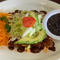 Enchiladas · Corn tortillas filled with chicken, choose topped green sauce or mole sauce  and fresh chees...