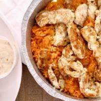 Aros Con Pollo · Rice and chicken smothered with cheese sauce.