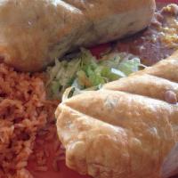 Chimichangas · Most popular. Two crispy fried flour tortillas filled with shredded meat or shrimp covered w...