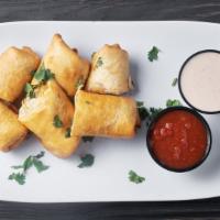 Swanky'S Eggrolls (4 Pc) · Tortillas with chicken, cheese, corn, spinach, black beans and cilantro served with with spi...