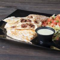 Grilled Quesadilla · Your choice of foundation with roasted garlic sauce and cheese, melted in a tortilla, served...