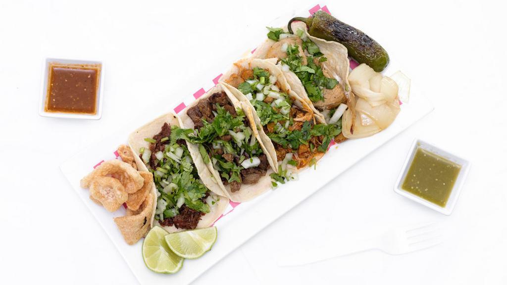 Tacos · Choice of meat, hand made corn tortilla, cilantro & onion