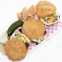 Gorditas · Deep fried hand made thick tortilla with topper, beans, choice of meat, lettuce, sour cream,...