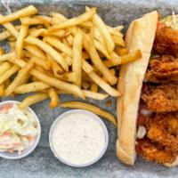 Shrimp Po' Boy · Hand breaded shrimp deep fried and served on toasted French bread with lettuce, tomato and r...