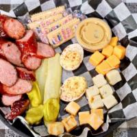 Cheese Plate · Sharp cheddar, pepper jack, smoked sausages, pickles, peppers, crackers and honey mustard