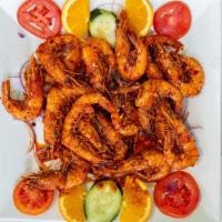 Camarones Cora · Fried shrimp with house spicy sauce.