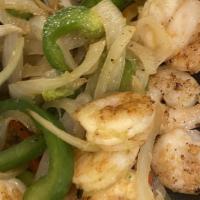 Fajitas De Camaron · Shrimp fajitas with vegetables and a side of rice and beans.