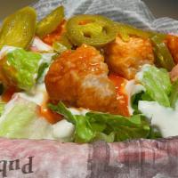 Buffalo Chicken Salad · fried chicken, lettuce, tomato, jalapeños, blue cheese dressing.