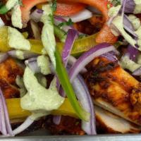 Tandoori Chicken With Rice And Veggies · Grilled Chunks of Chicken Breast with Onions and Peppers, Served with Rice and Veggies