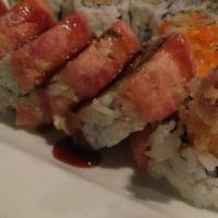 Fantasy Roll · Shrimp tempura inside and spicy tuna on top.