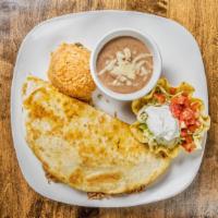 Quesadilla Grande (Beef Or Shredded Chicken) · Flour tortilla filled with cheese and your choice of meat. Served with rice, beans lettuce, ...