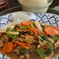 Ped Ga Paow (Basil Duck) · Roasted duck sautéed with bell peppers, carrots, fresh basil leaves, and onions.