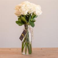 Dozen White Roses  · A dozen white roses 

Vase inculed.
