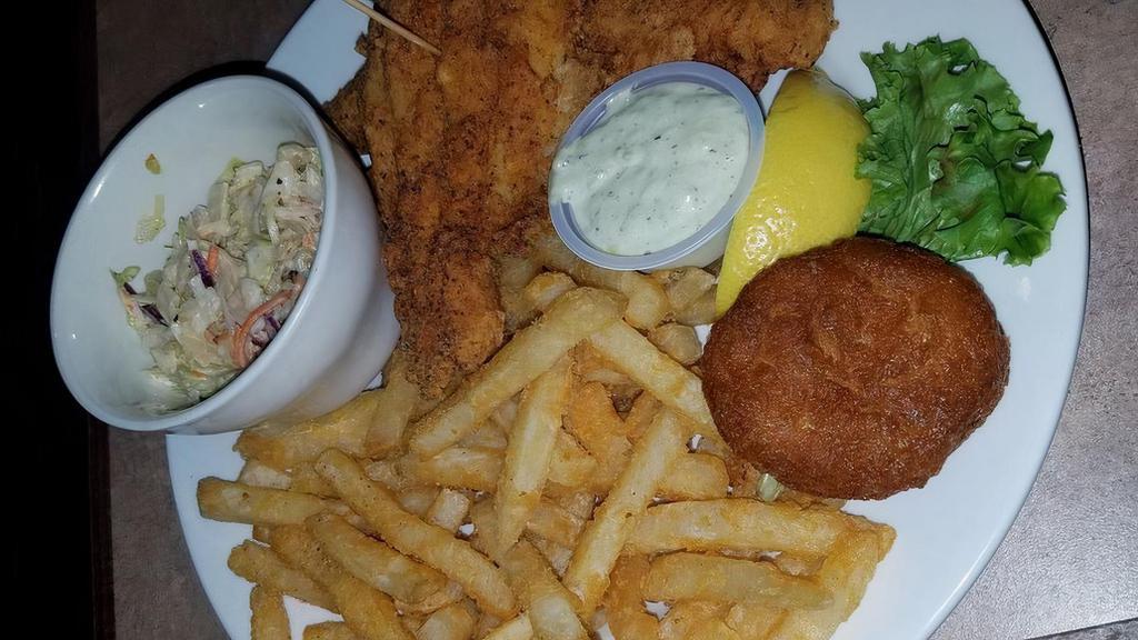 Fried Catfish Platter · Fried catfish platter two large catfish fillets served with tarter sauce, hot water cornbread, and choice of spicy slaw or green tomato relish, and crispy or Cajun fries.