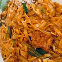 Pad Thai · Mild. Rice noodles, egg, tofu, bean sprouts and chives in tamarind sauce topped with crushed...