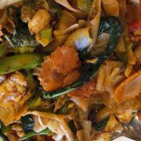 Pad Kee Mow · Mild. Flat noodles, broccoli, Chinese broccoli, carrot, bell pepper, onion and basil with ch...