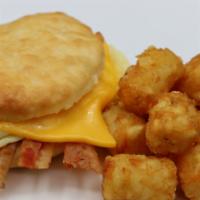 Egg And Cheese Biscuit/Toast · Artisan biscuit /toast sandwich fried egg & American cheese Add bacon $1.50