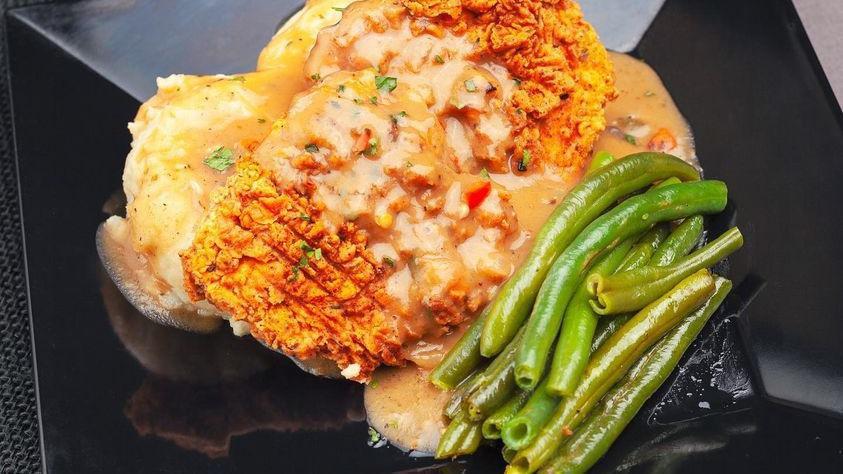 Country Fried Chic'N With Gravy  · Choose two sides