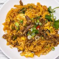 Thai Basil Fried Rice · Spicy. Tossed with bell pepper, onion, egg, scallion and basil leaves. Choice of chicken, or...