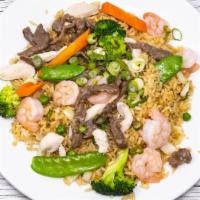 Mei Wei Fried Rice · Chicken, beef, shrimp and vegetable mixed in.