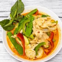 Red Curry · Spicy. Shredded red and green pepper, onion, snow peas and zucchini sautéed in a red coconut...
