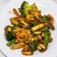 Triple Delight · Jumbo shrimp, chicken, beef with fresh mushroom, broccoli, snow peas, carrot, water chestnut...