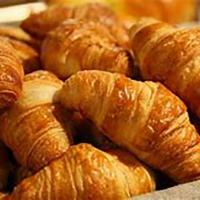 Croissant · Multiple layers of butter are baked into the dough, giving these croissants the flakiest tex...
