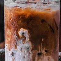 Iced Caramel Macchiato · Our Iced Macchiato is light and airy with layers of fluffy foam*, cascading espresso, vanill...
