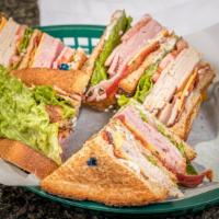 Check'S Club Sandwich · Turkey, ham and bacon with American cheese, lettuce, tomato and mayo