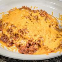 Check'S Chili Cheese Fries · An extra-large helping of fries covered with our world famous chili and shredded cheddar
