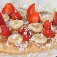 Pb Banana Berry Flatbread · Peanut butter, banana, strawberry, honey, powdered sugar
